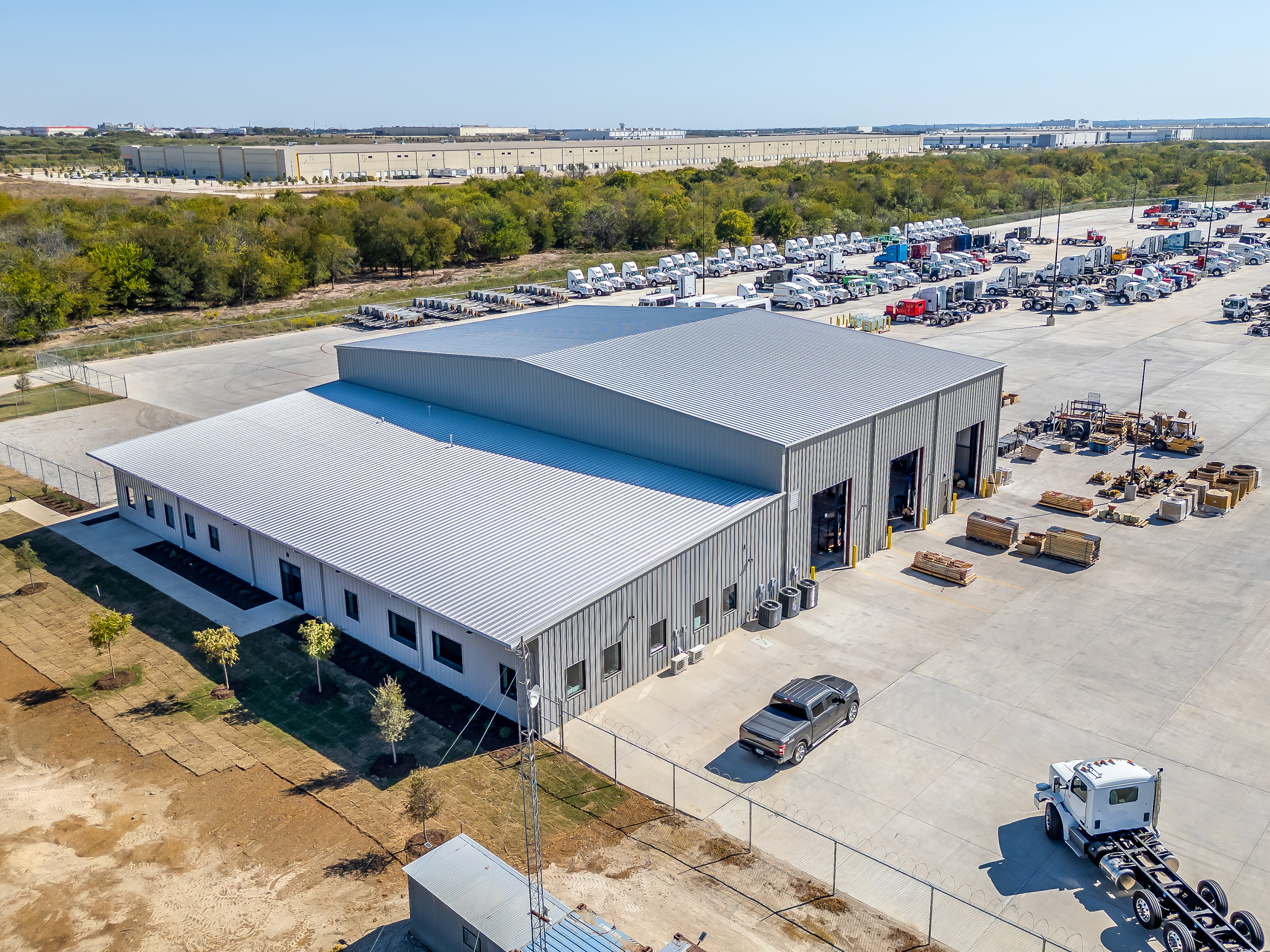 Aerial view of the Active Trucking facility and fleet